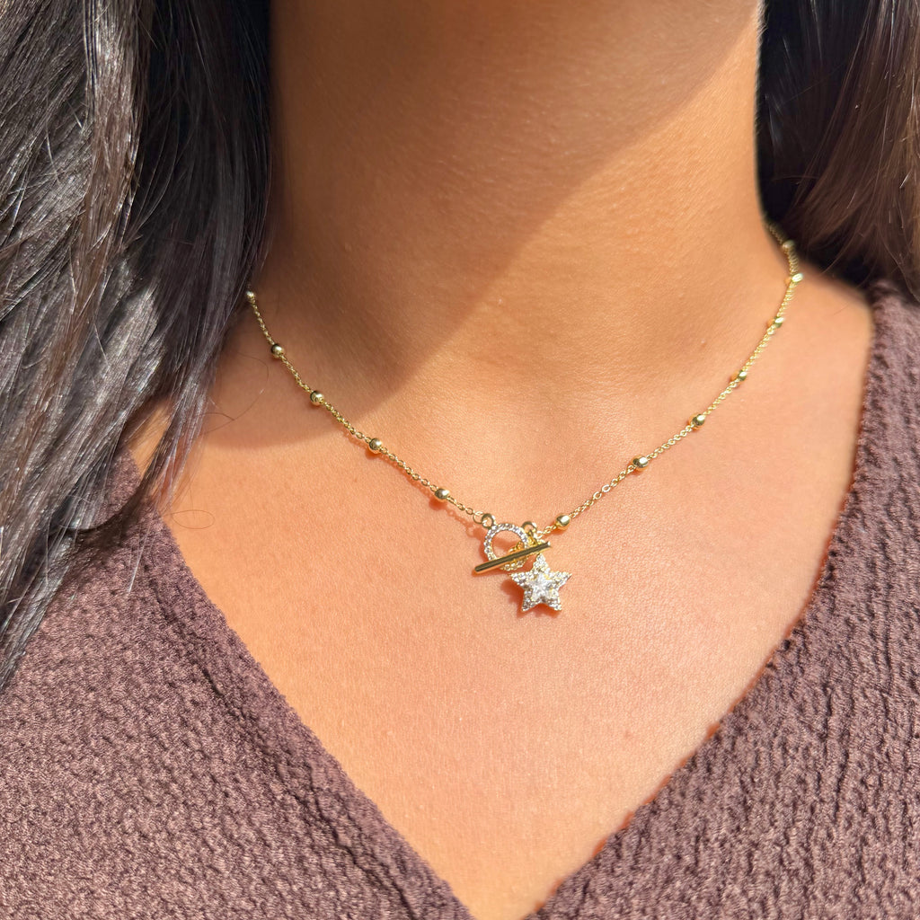 DANGLING STAR NECKLACE