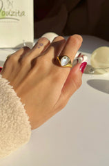Oval white ring