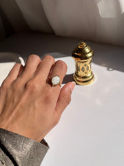 White oval ring