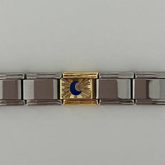 Blue crescent charm