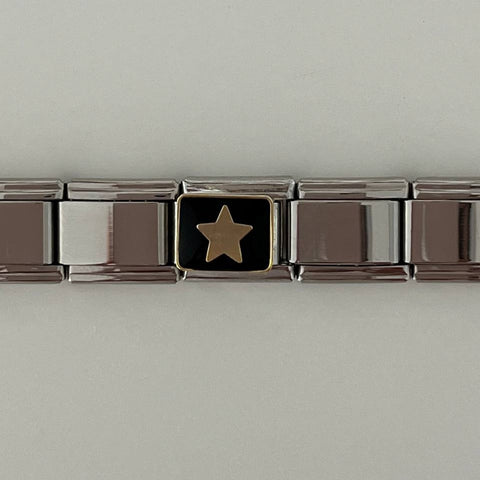 Gold star charm