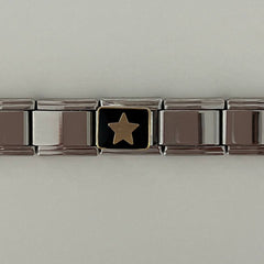 Gold star charm