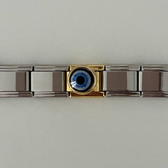 Gold blue eye charm