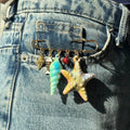 Sandy memories pin