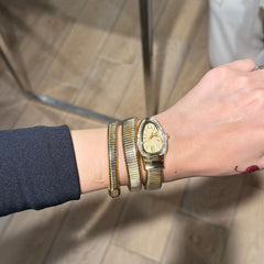 Gold snake watch